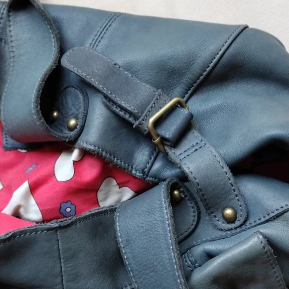Anthropologie,Lucky Penny, leather purse with heart lining .
